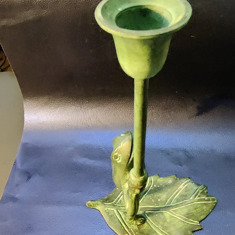 Brass Frog Sculpture holding a candlestick while floating on a lilypad 11